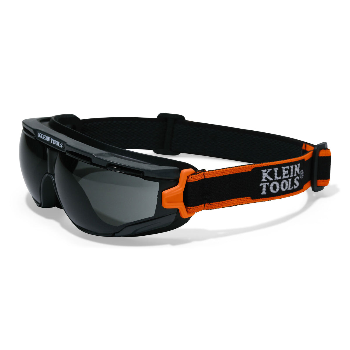 Klein Tools 03611 compact safety goggles with shaded gray lens and black and orange frame