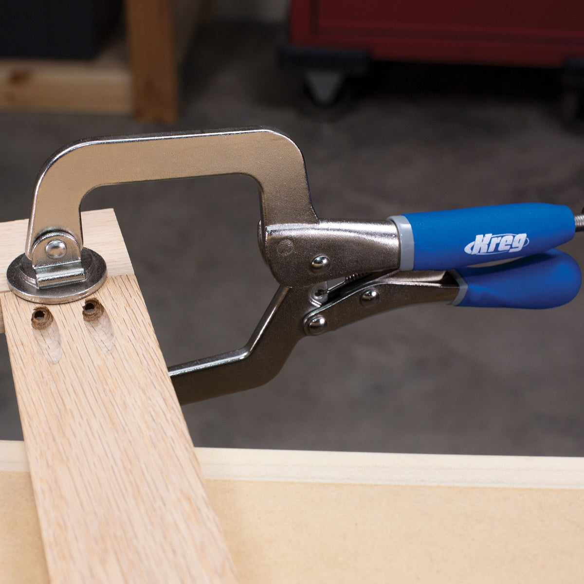 Kreg Tool KHC-PREMIUM Classic 3 Inch Face Clamp holding hardwood boards flush during pocket-hole joinery assembly on a workbench