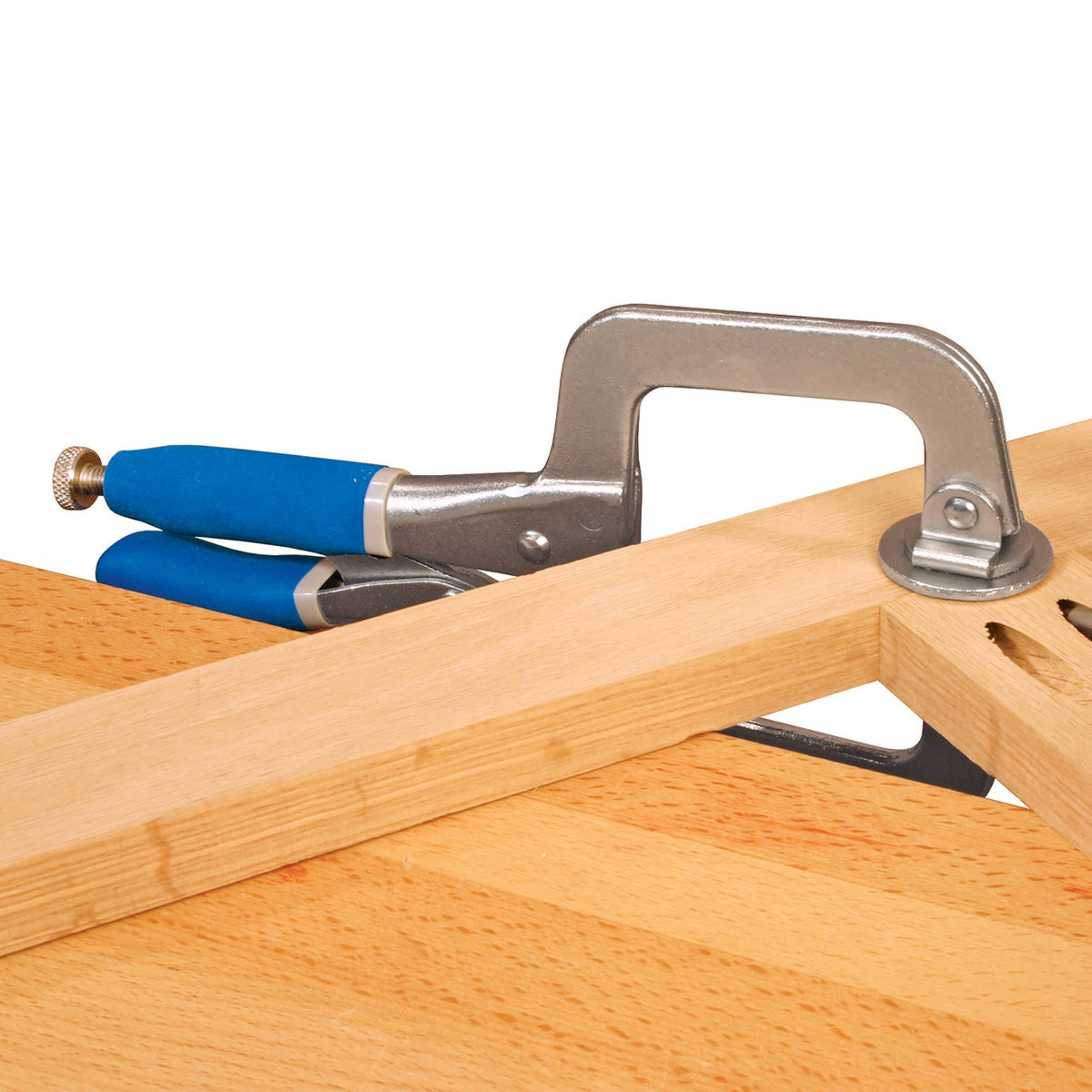 Kreg Tool KHC-PREMIUM Classic 3 Inch Face Clamp securing a wood pocket-hole joint on a benchtop for repeat assembly work