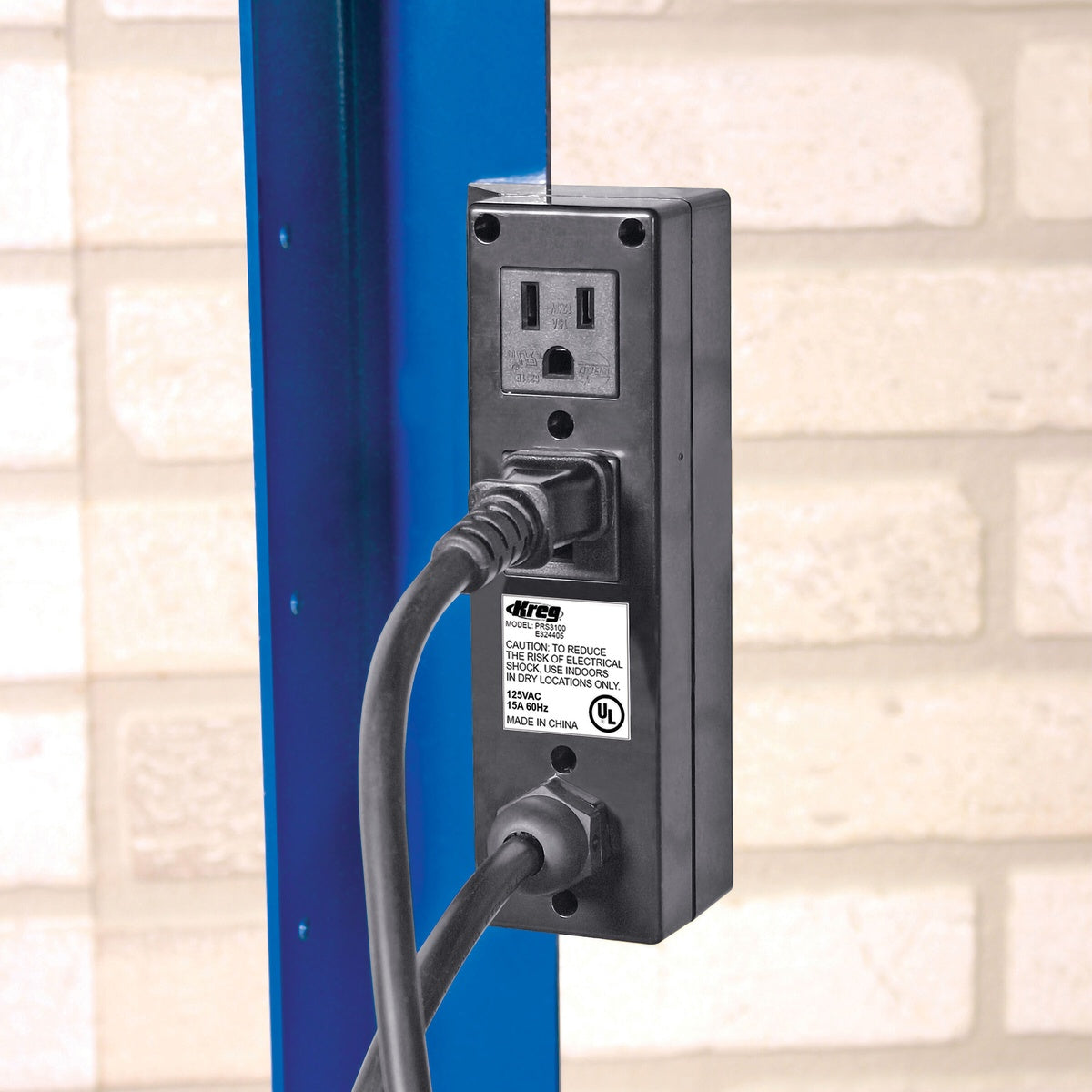 Kreg PRS3100 Multi-Purpose Router Table Switch with dual outlets and connected cords mounted on a router table in a woodworking shop
