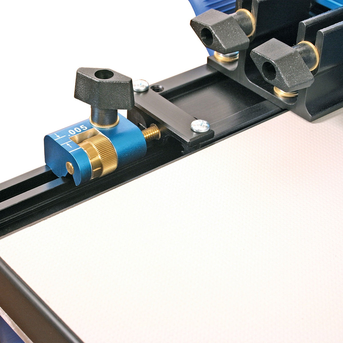 Kreg KMS7215 Micro Adjuster installed on a Kreg band saw fence during woodworking fence setup for precise cutting adjustments