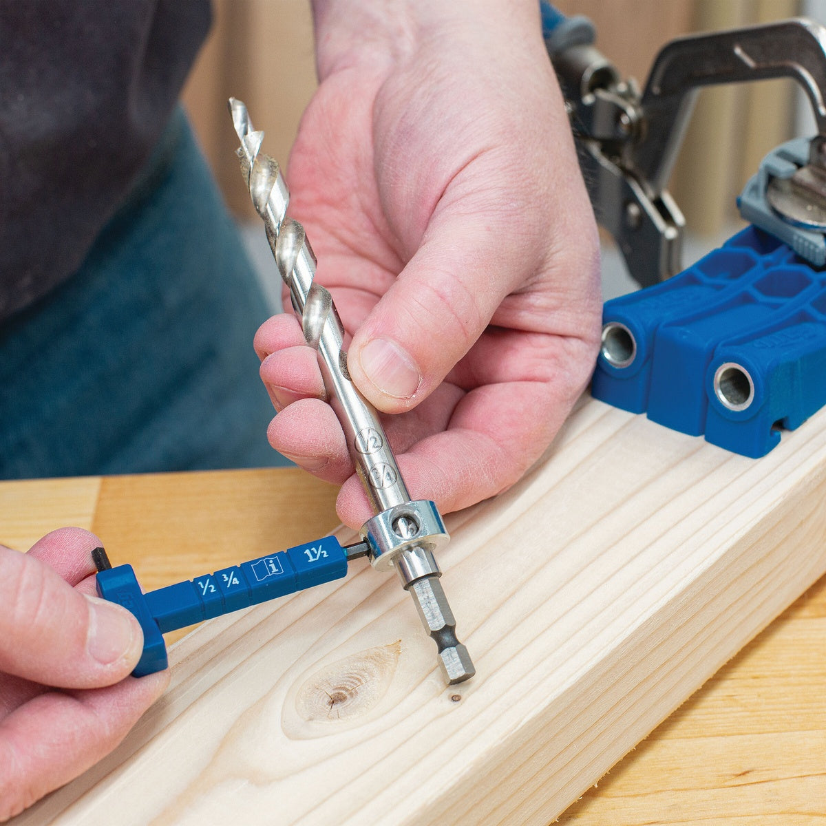 Kreg Easy-Set Drill Bit with Stop Collar &amp; Gauge/Hex Wrench being set for pocket-hole drilling in softwood lumber at a woodworking bench