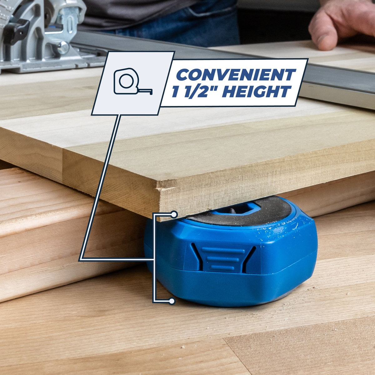Kreg KFS-PUCK Multipurpose Project Blocks supporting a wood panel above a workbench for routing and sanding clearance