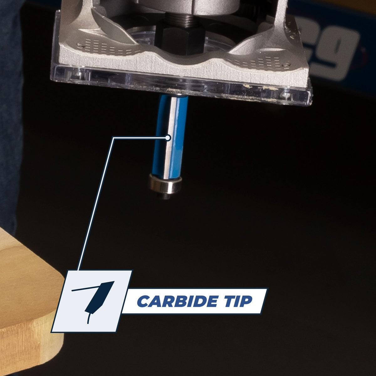 Kreg Tool PRS250 Flush-Trim Bit, 1/4 in. Shank installed in a trim router for edge trimming on a woodworking bench