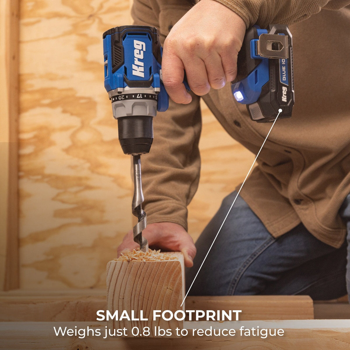 Kreg BATT2A 20V Blue Ion 2.0 Ah Battery Pack installed on a Kreg cordless drill during wood drilling on a jobsite-style workbench