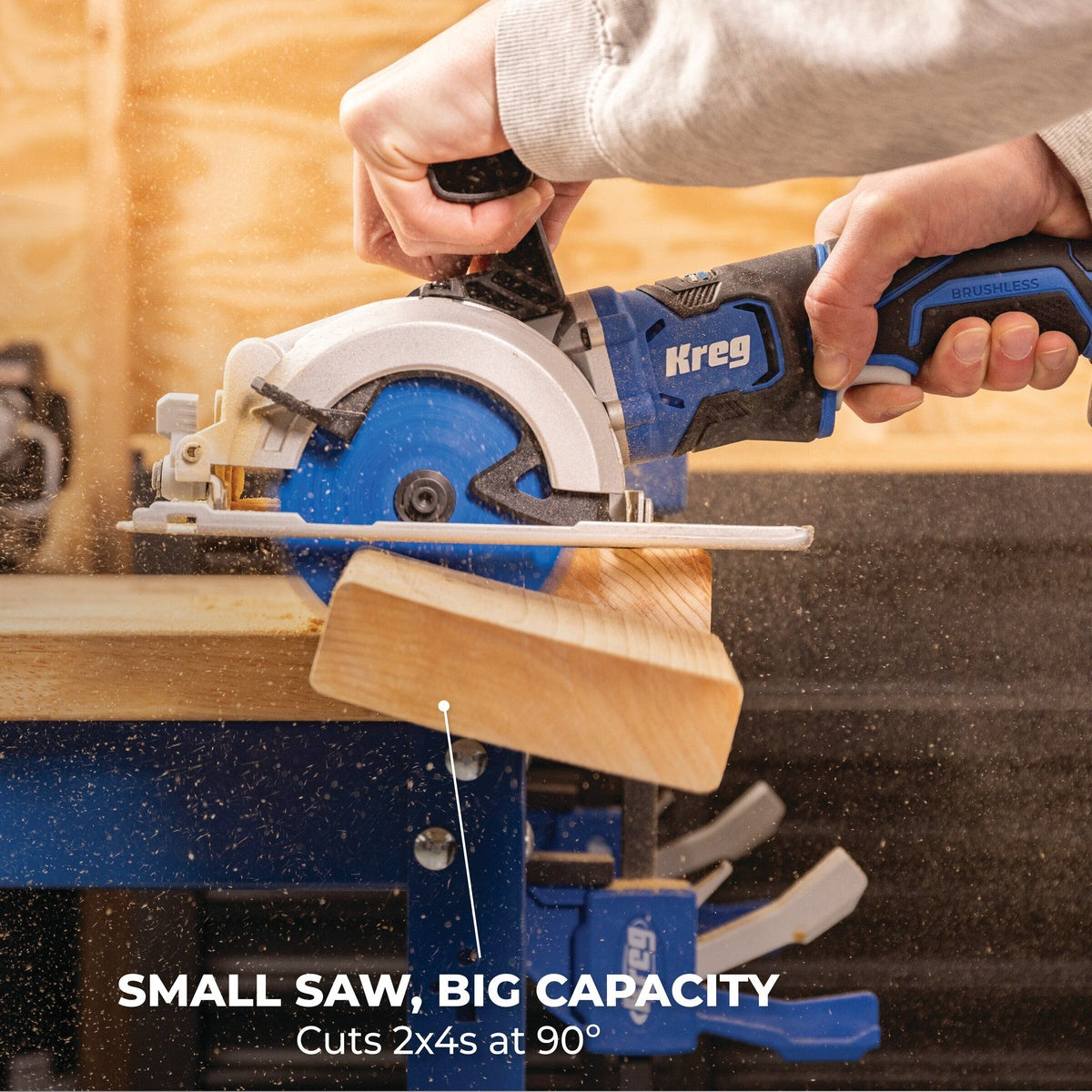 Kreg KPTCS450A 20V Ionic Drive 4-1/2-in Circular Saw cutting wood on a workbench during a shop project with sawdust visible