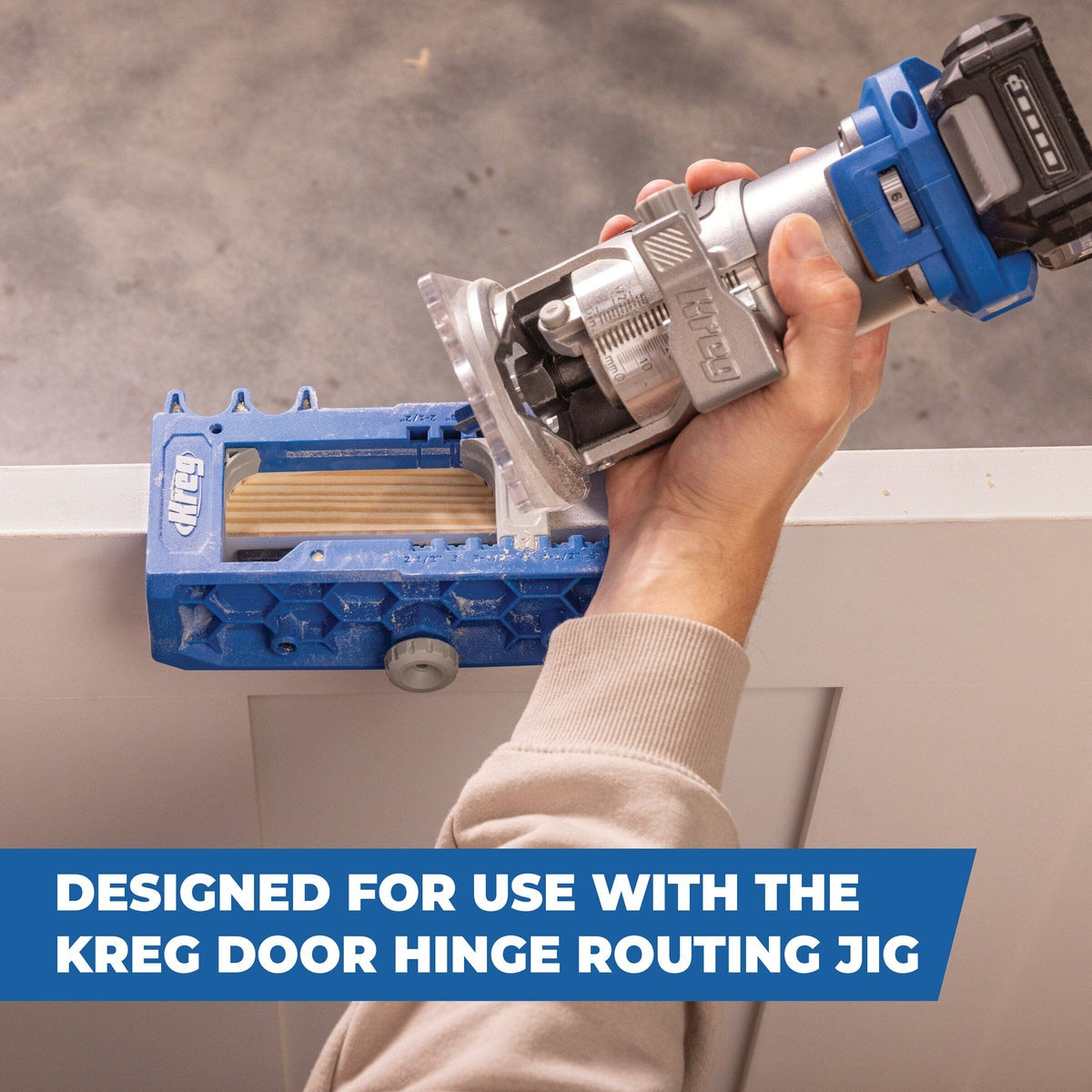 Kreg 1/2 inch Flush Trim Bit - 1/4 inch Shank used in a compact router with the Kreg Door Hinge Routing Jig on a painted interior door for hinge mortising