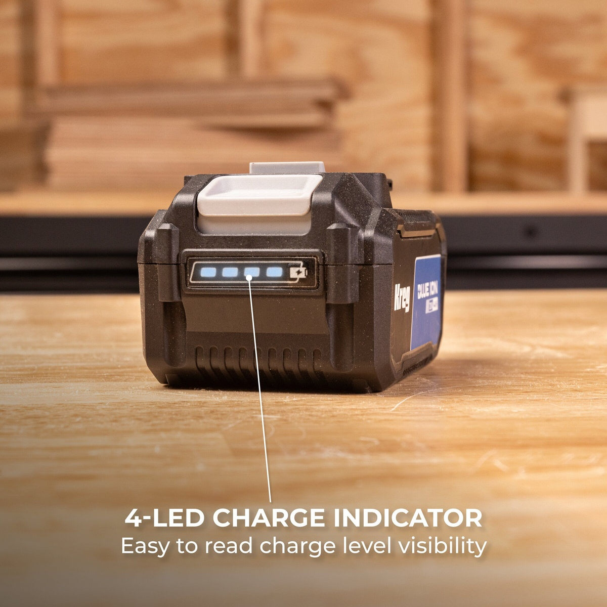 Kreg 20V Blue Ion 8.0Ah Battery Pack showing the 4 LED charge indicator on a workshop bench during tool setup