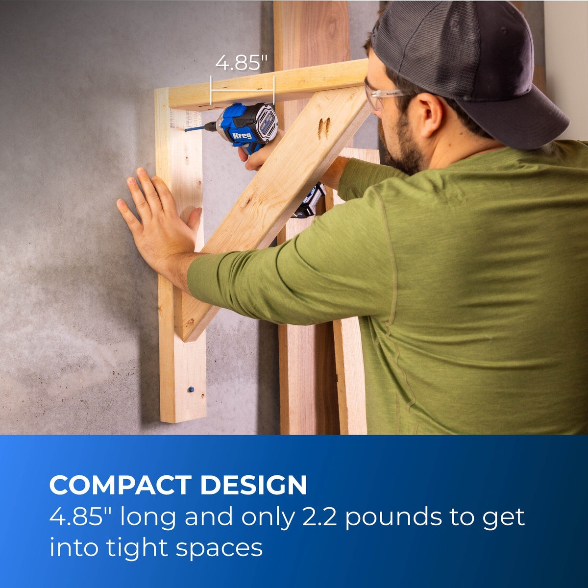 Kreg 20V Ionic Drive 1/2 inch Compact Impact Wrench driving a fastener in wood framing inside a tight workshop corner