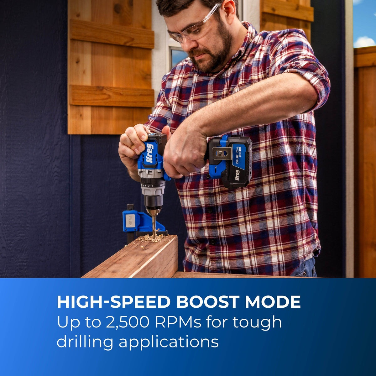 Kreg 20V Ionic Drive 1/2 inch High Speed Hammer Drill drilling into a wood beam on a jobsite bench for fast framing and construction work