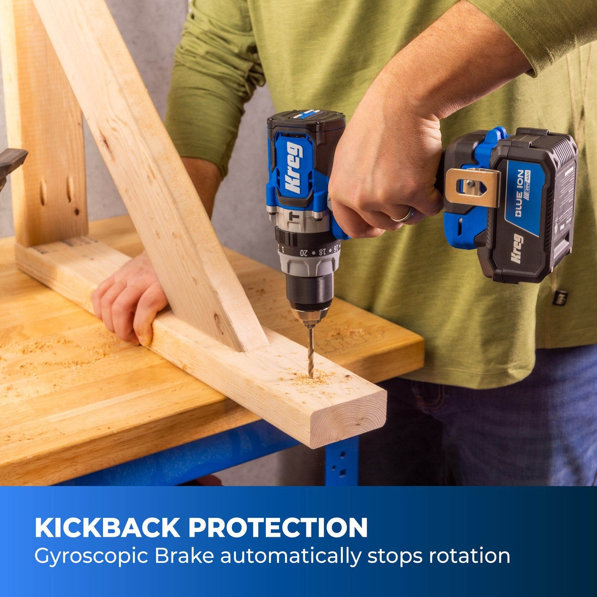 Kreg 20V Ionic Drive 1/2 inch High Speed Hammer Drill boring into framing lumber on a workbench during fastening and drilling tasks