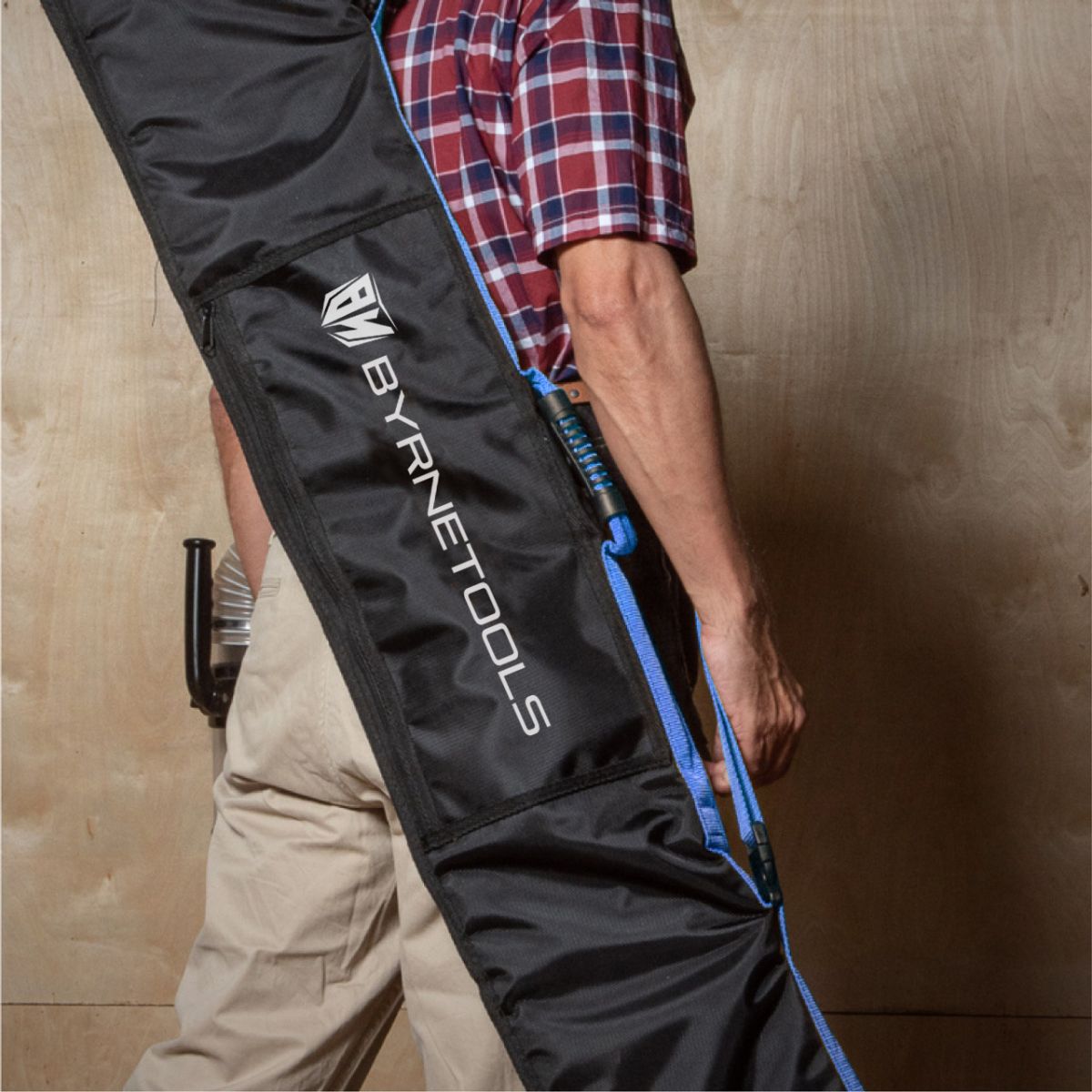 Byrne Guide Rail Bag 1400mm carried over the shoulder using the adjustable shoulder strap