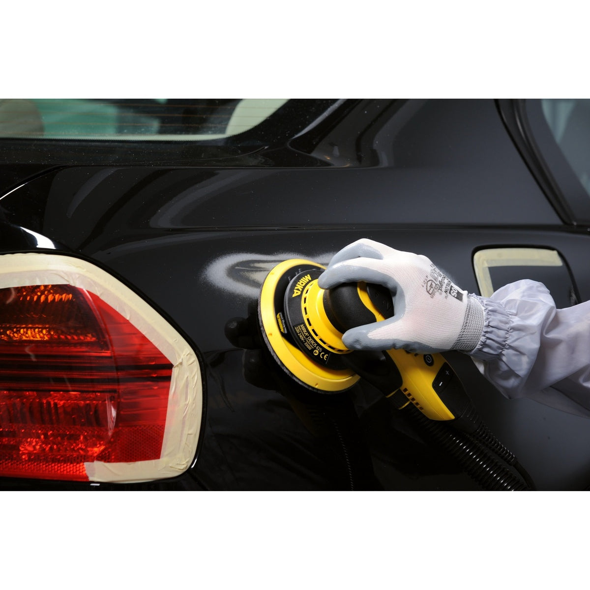 Mirka DEROS II 625X random orbital sander in use on an automotive panel