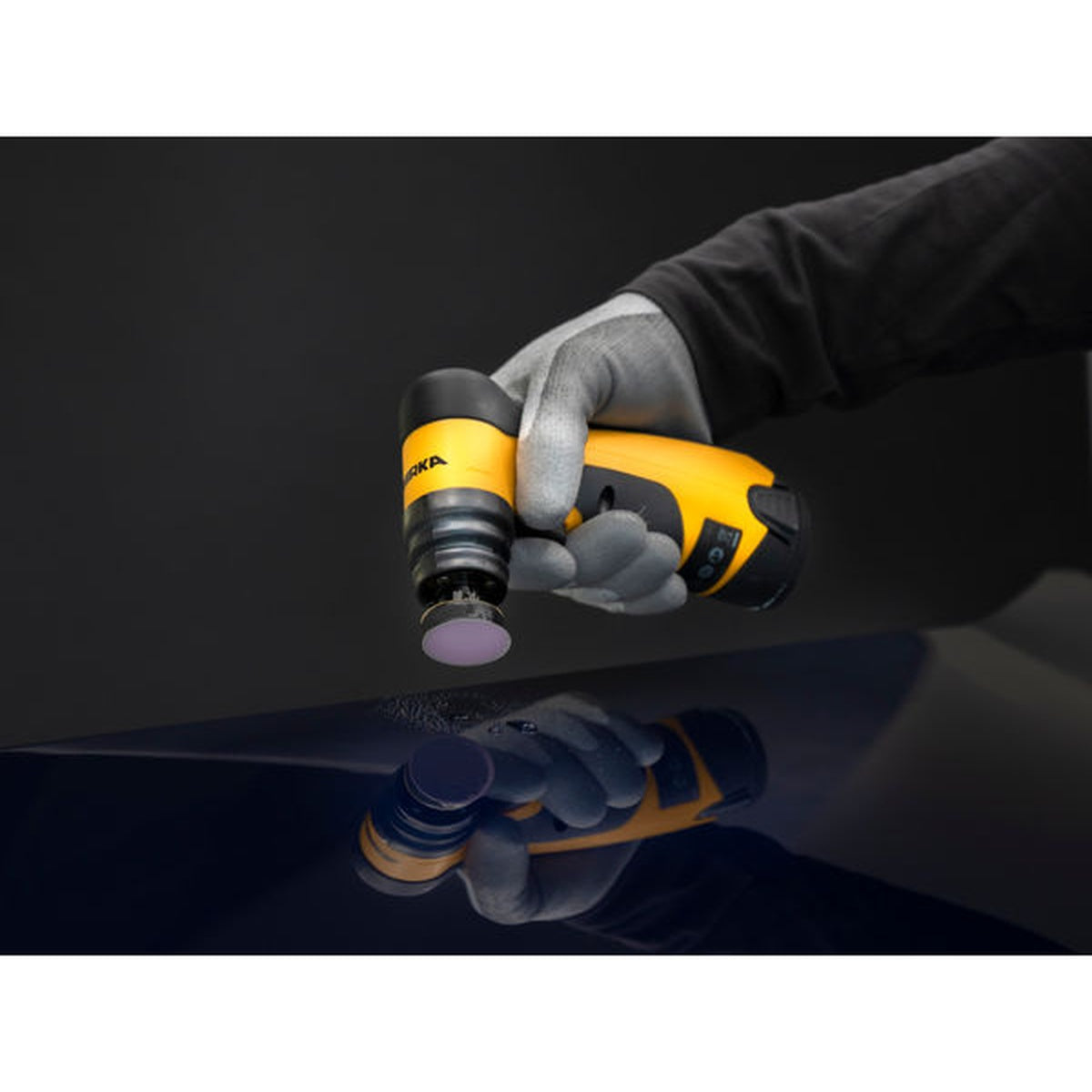 Mirka Iridium SR purple finishing disc used with a Mirka cordless spot repair sander