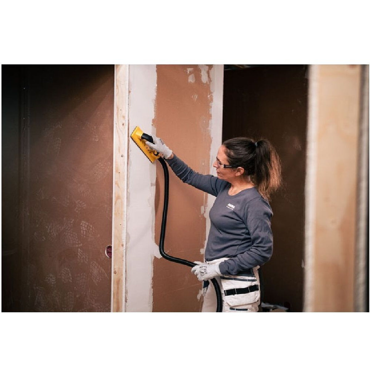 Mirka Abranet sanding mesh used on a vacuum-assisted hand sander