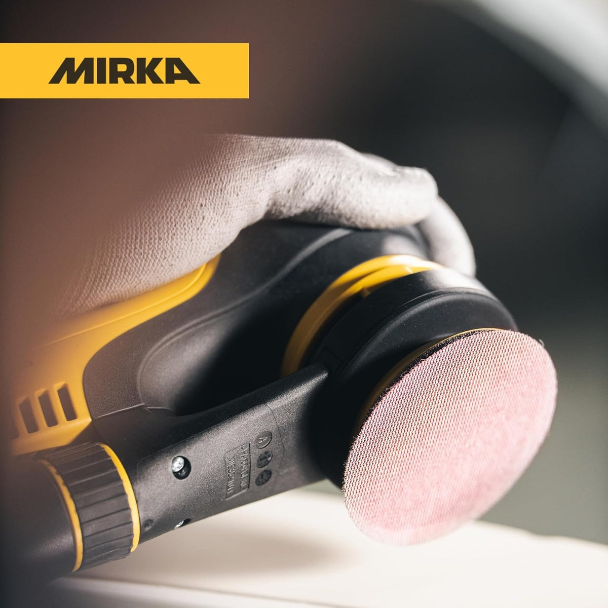 Mirka Abranet 3-inch sanding disc attached to orbital sander