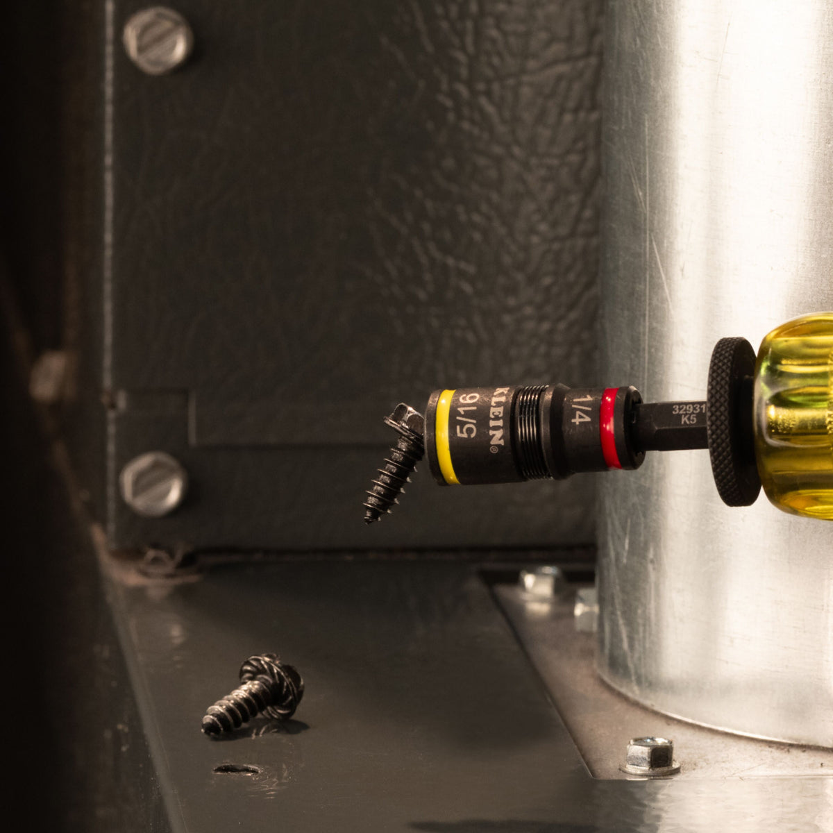 Klein Tools 32931P impact flip socket driving a hex-head screw with an impact driver