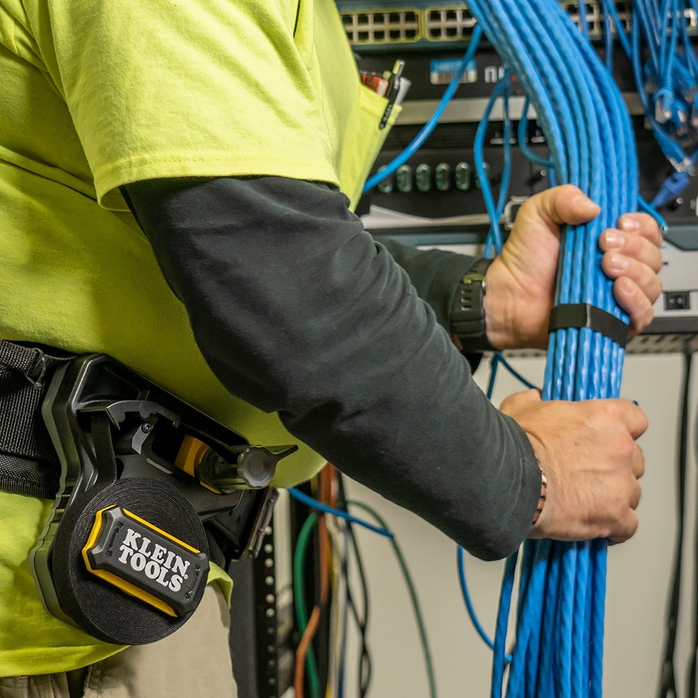 Klein hook and loop tape securing a cable bundle