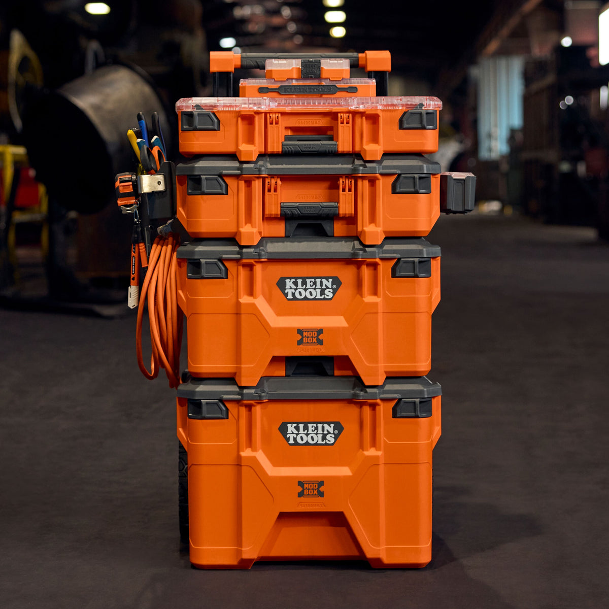 Klein Tools 54400MBX MODbox full-width component box in use in a MODbox system on a jobsite