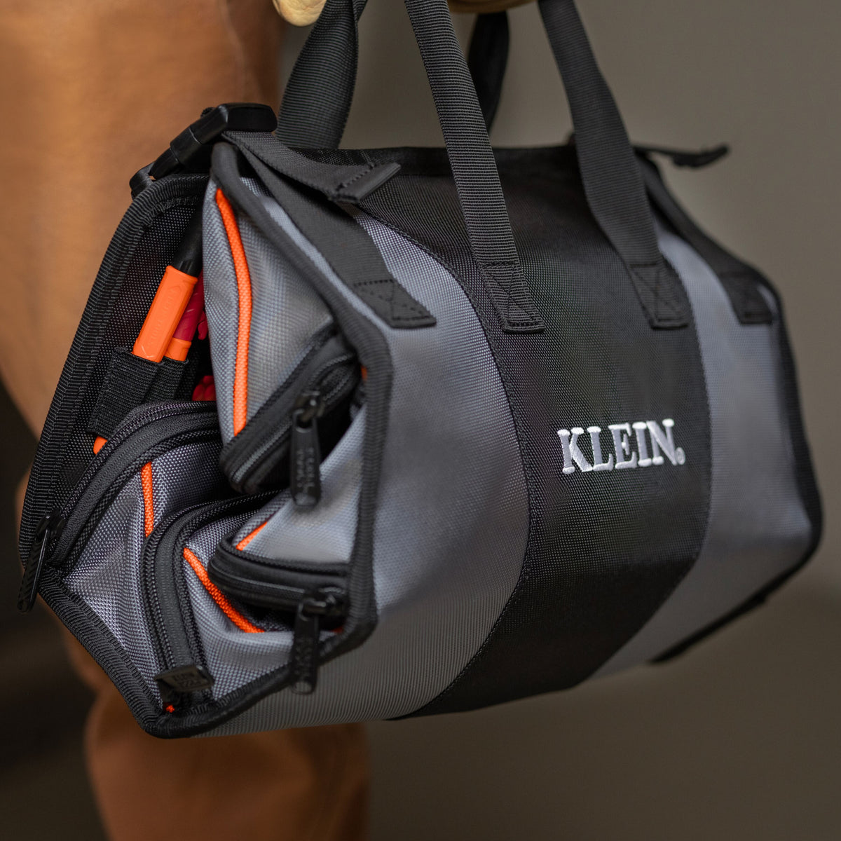 Klein Tools 54309MB roll up pouch rolled and buckled for carrying between jobs