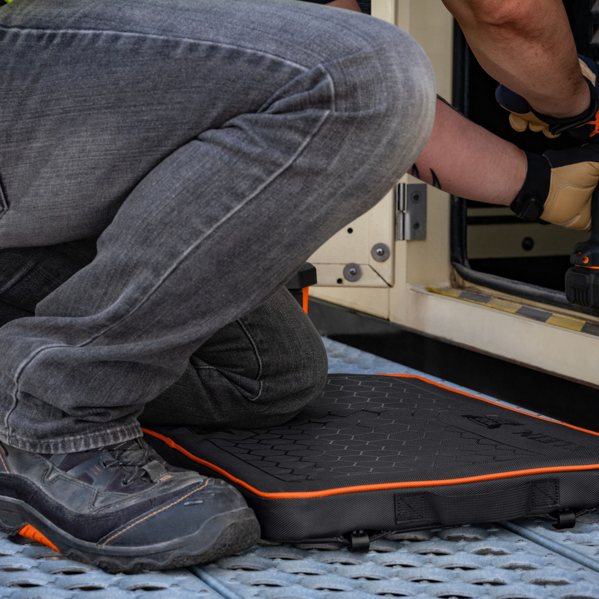Klein Tools 54836MB kneeling pad used on the floor during electrical work