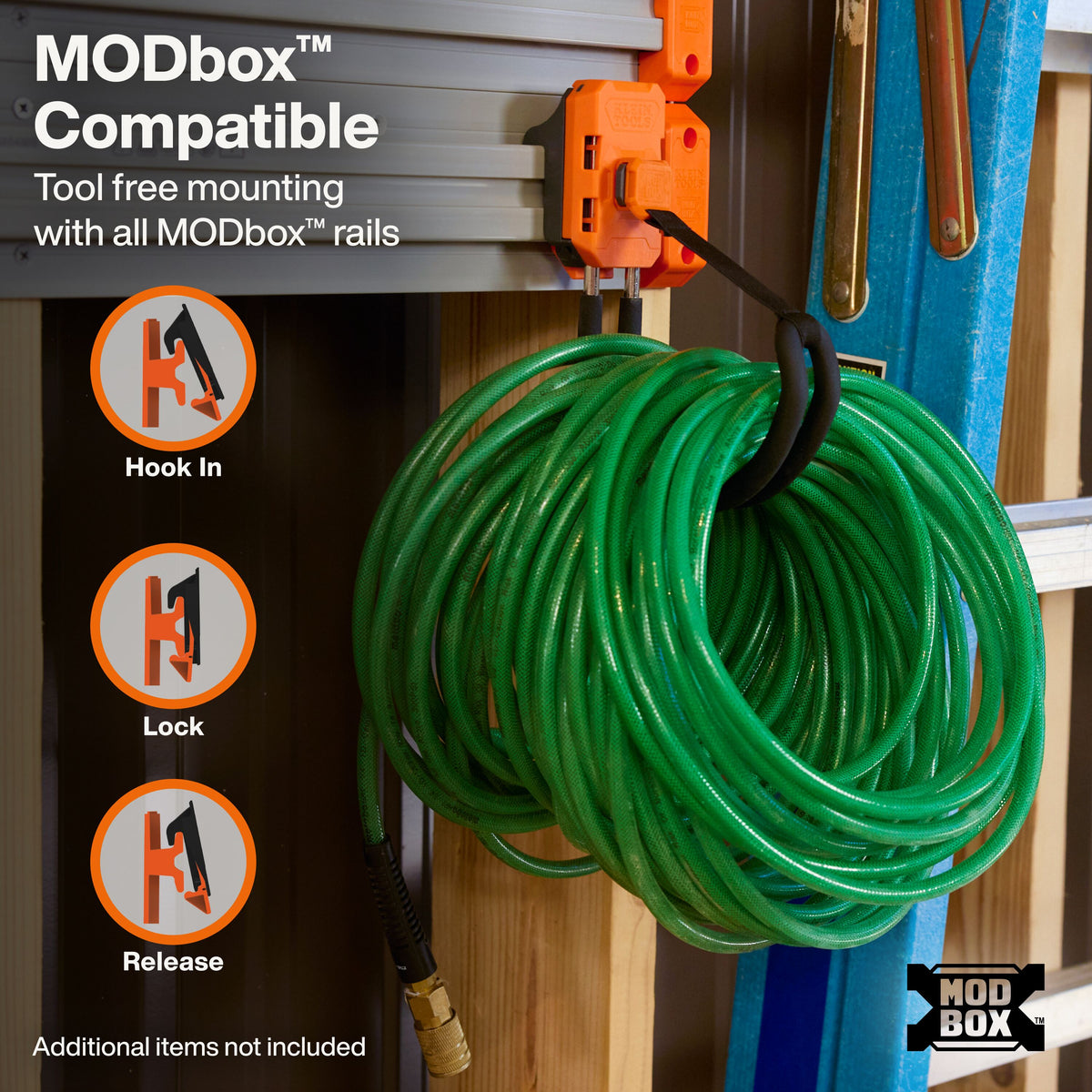 Klein Tools 54859MB J-hook holding a coiled hose with the strap closed
