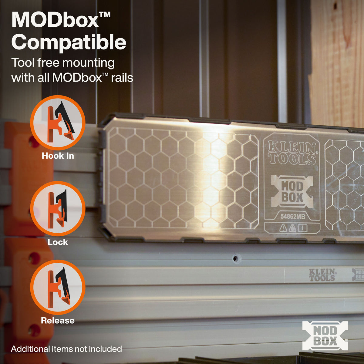 Klein Tools MODbox Wall System Steel Mount (54862MB) steel surface holding a magnetic fan and speaker