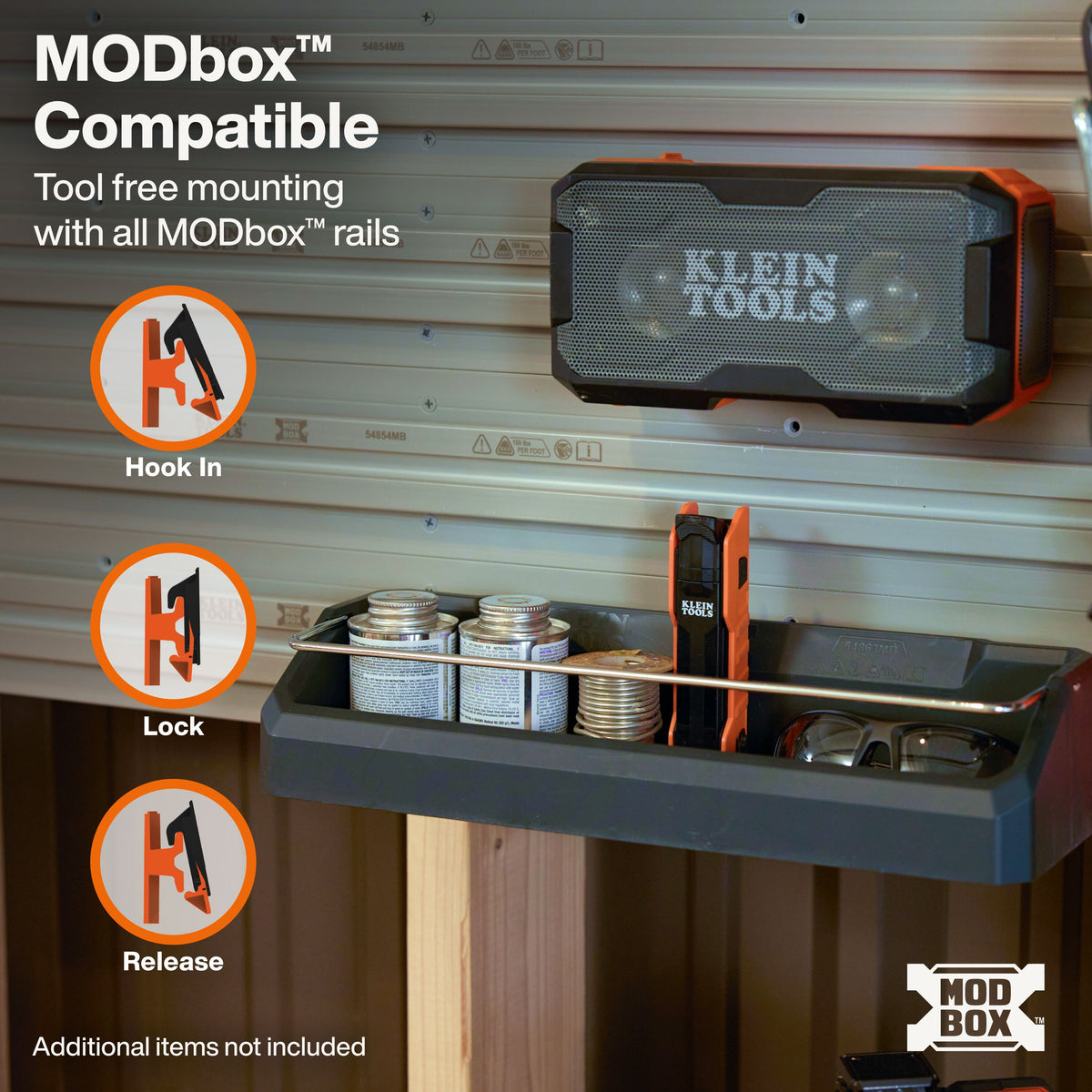 Klein Tools MODbox Wall System Narrow Shelf (54863MB) steel retention rod keeping cans in place in a moving van