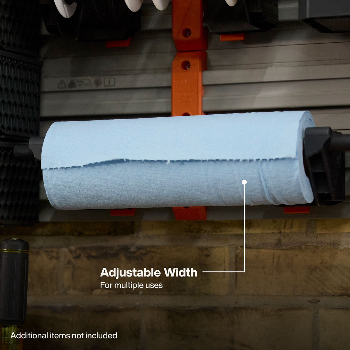 Klein Tools MODbox Spool Holder Rail Attachment (54866MB) used as a paper towel roll holder in a shop