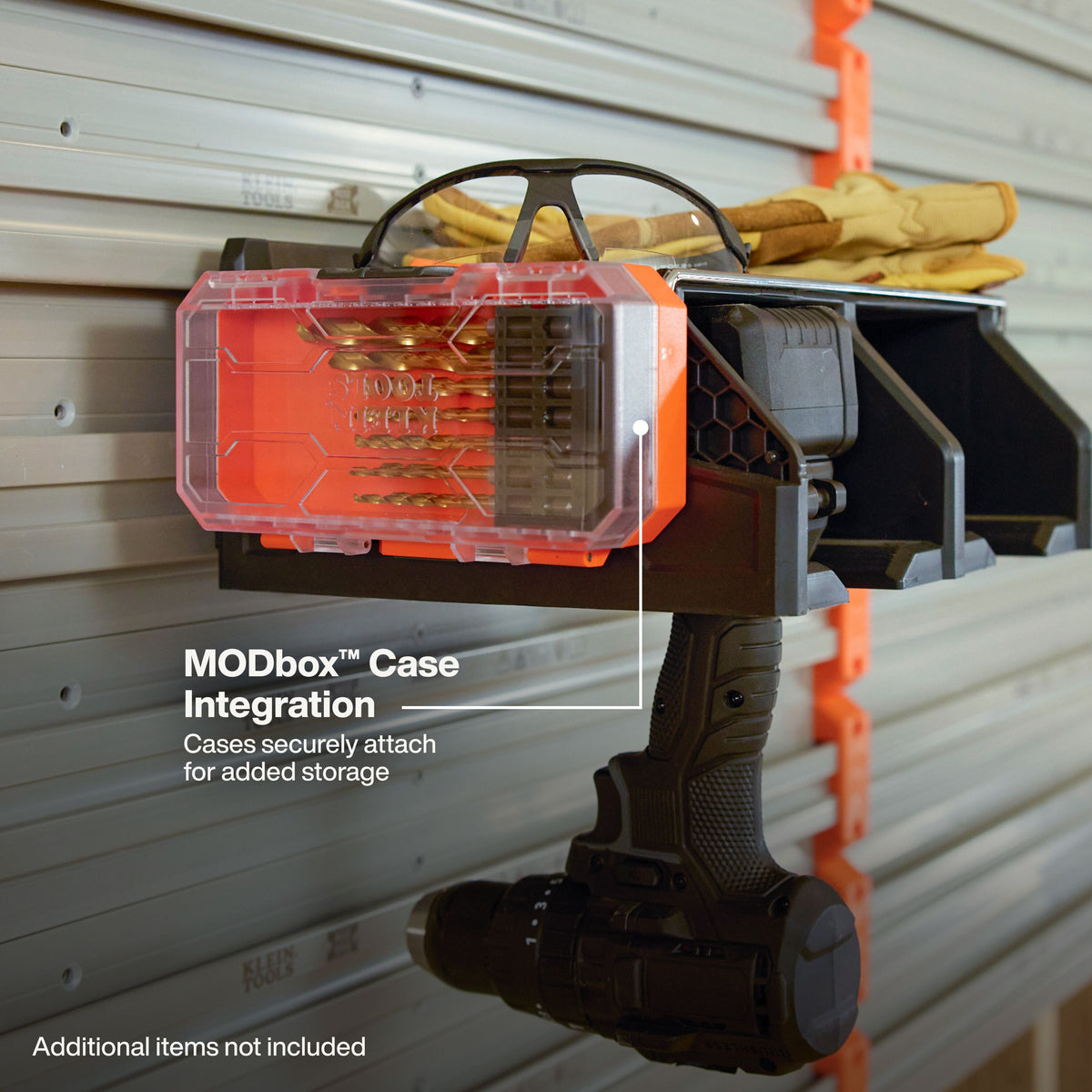 Klein Tools MODbox Wall System Power Tool Dock (54867MB) side slots holding MODbox bit cases and battery holders