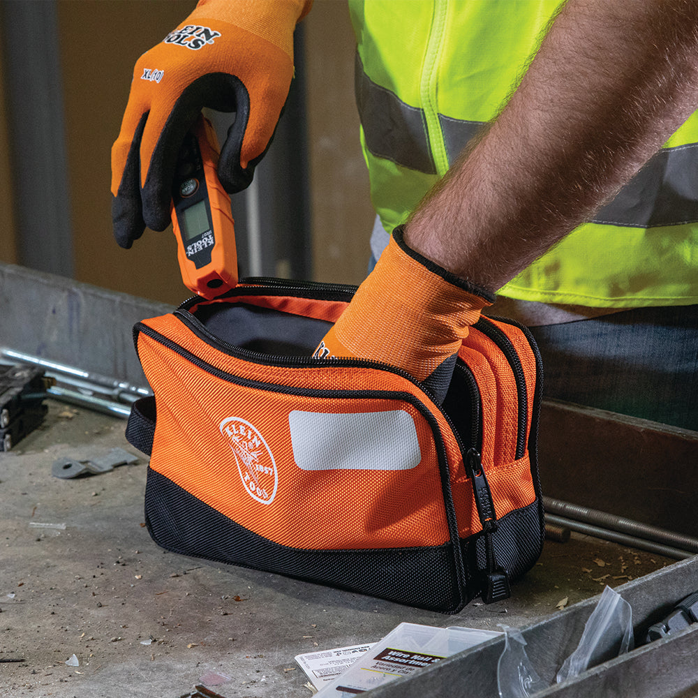 Klein orange double zipper bag holding job supplies