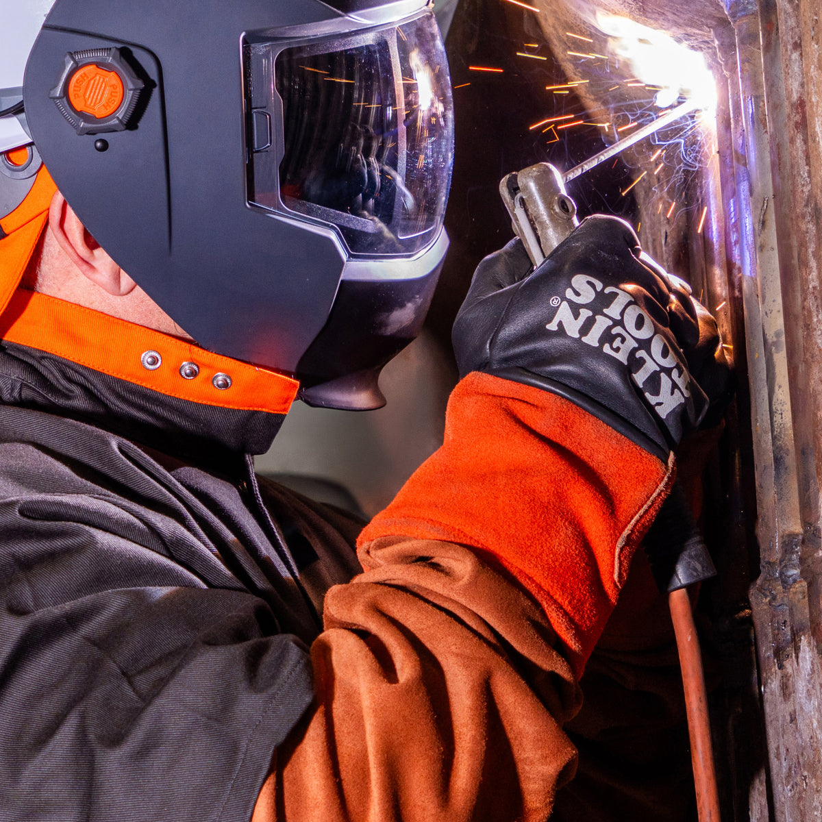 Klein leather welding sleeves worn on a welding jobsite