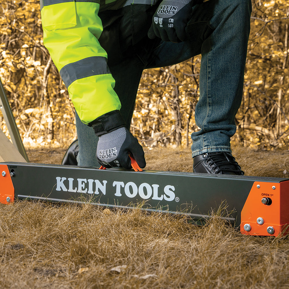 Klein winter knit dipped gloves in use on a jobsite