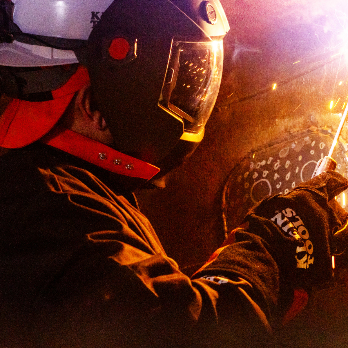 Klein flame-resistant cotton welding sleeves on a welding jobsite