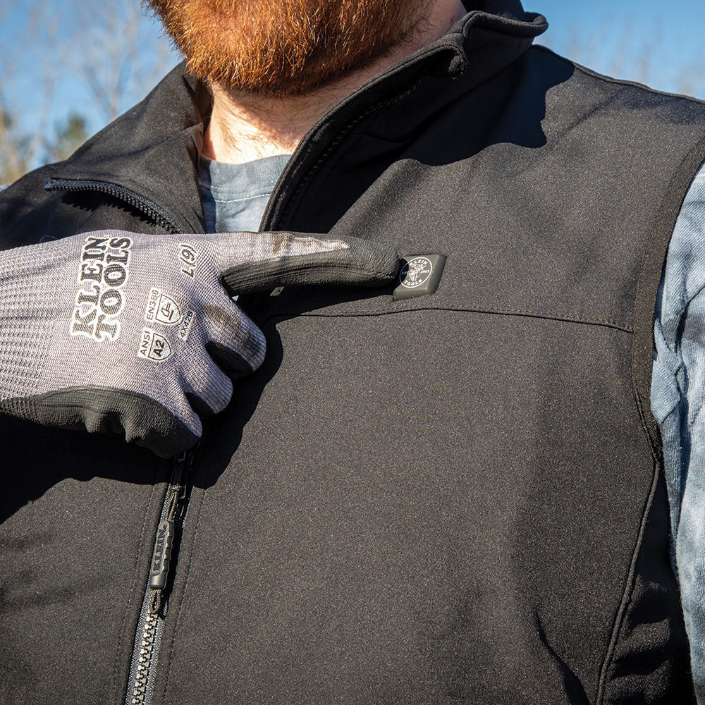 Klein heated base layer vest in use outdoors