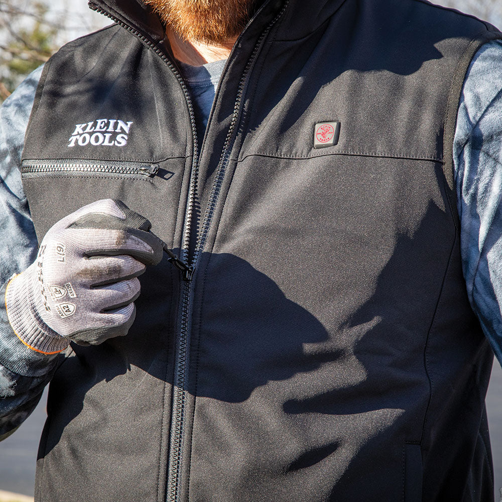 Klein heated base layer vest in use during outdoor work