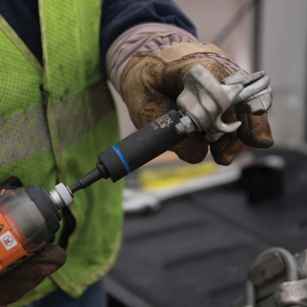 Klein 66060 impact socket driving a nut on a utility pole