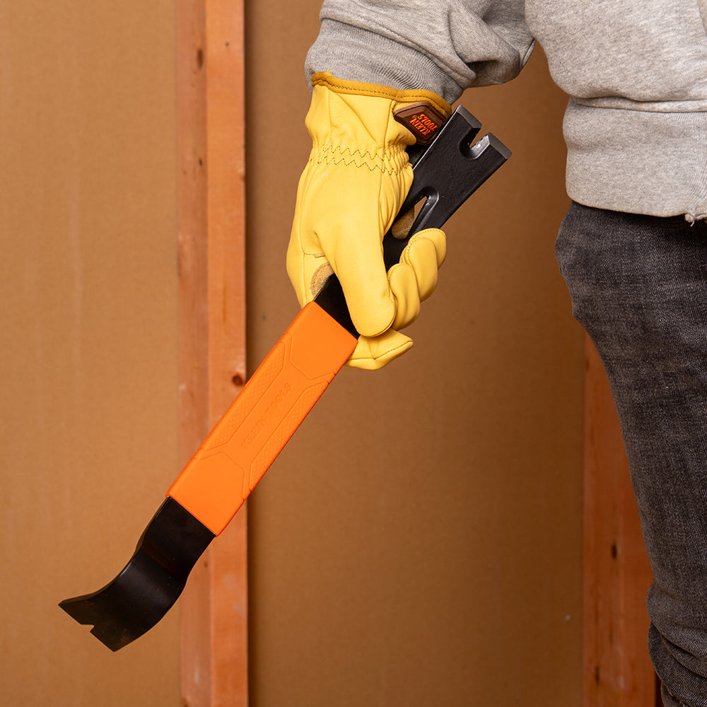 Klein 15-in. heavy-duty pry bar in use on demolition
