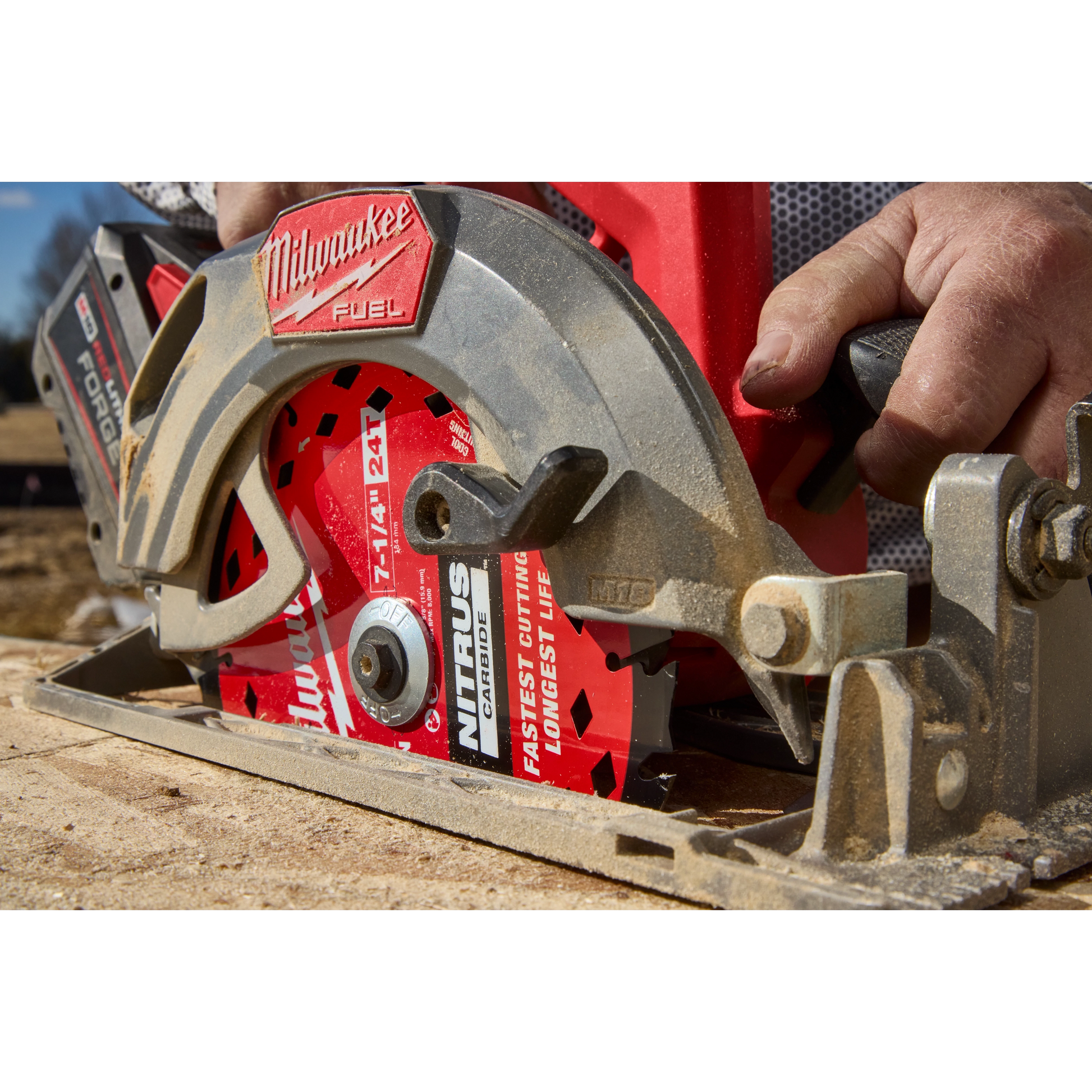 Milwaukee M18 FUEL circular saw fitted with a NITRUS Carbide blade cutting through framing lumber