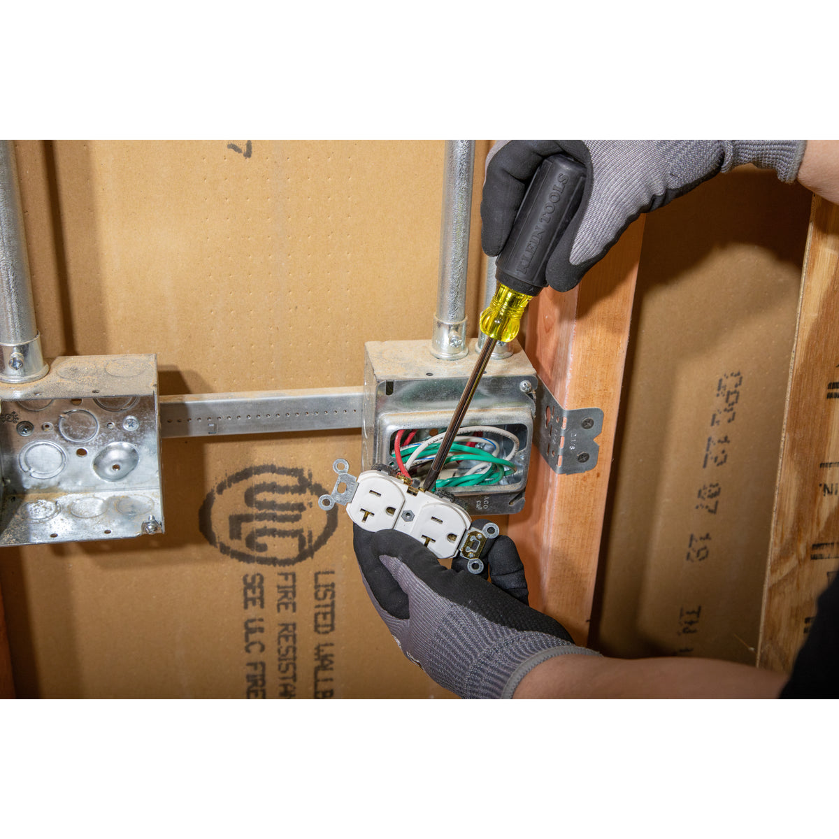Klein 85805 Phillips screwdriver driving a screw on a job