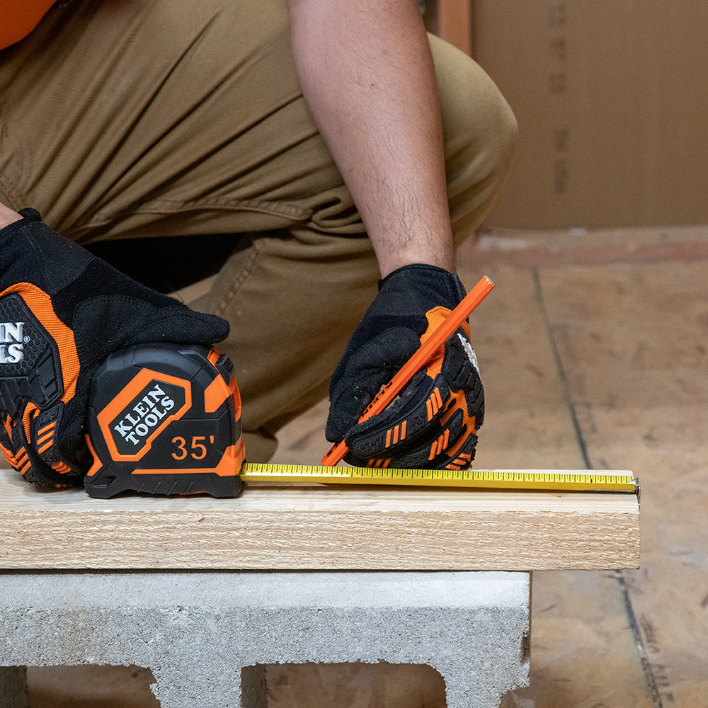 Klein 35-ft. tape measure hooked on material