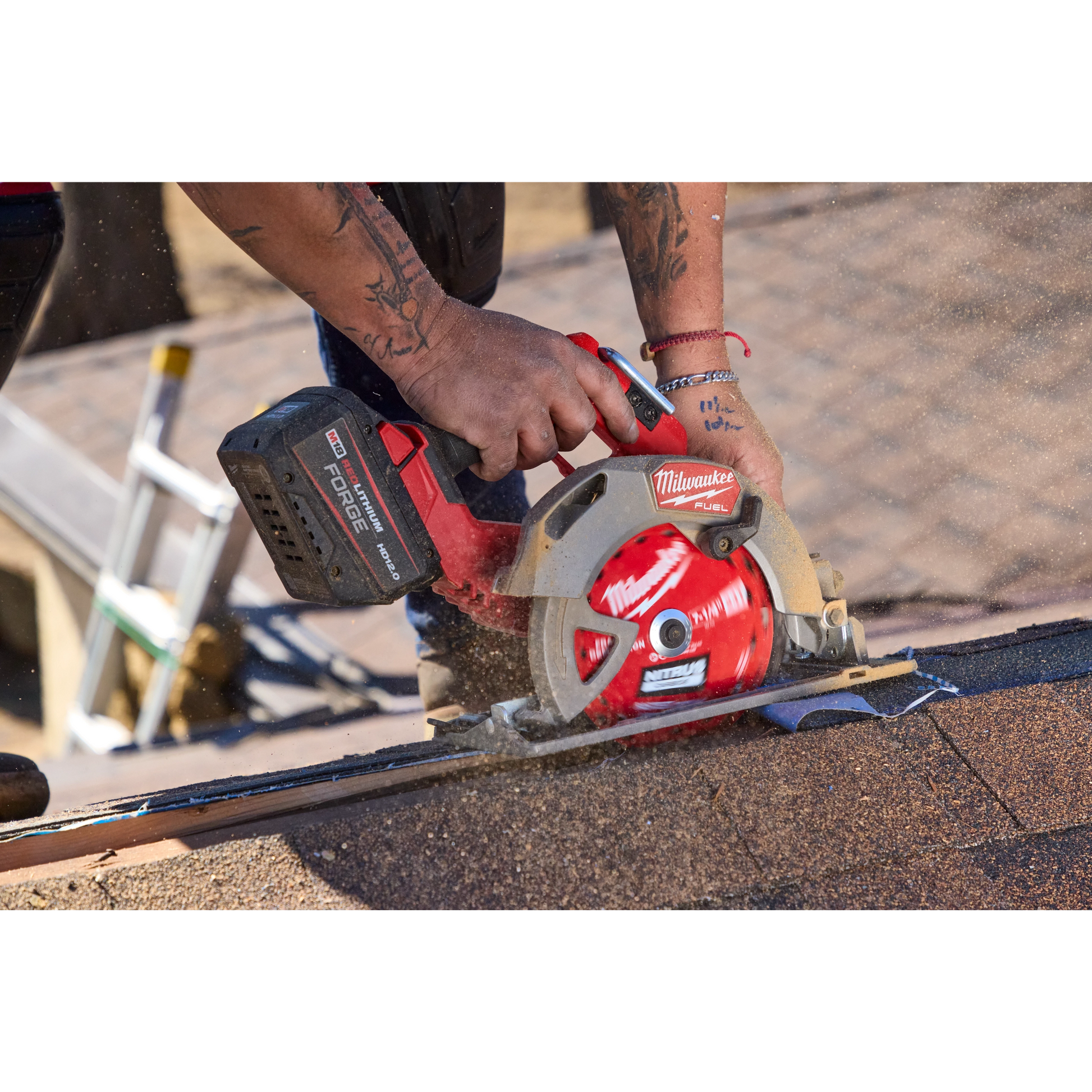 Milwaukee NITRUS Carbide circular saw blade cutting through roofing shingles, generating sawdust