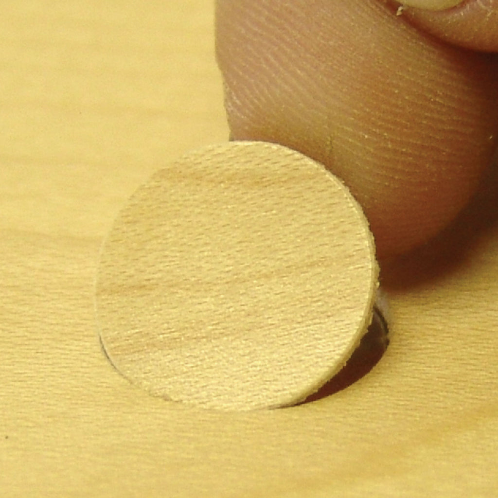 FastCap custom veneer screw cover installed on cabinet