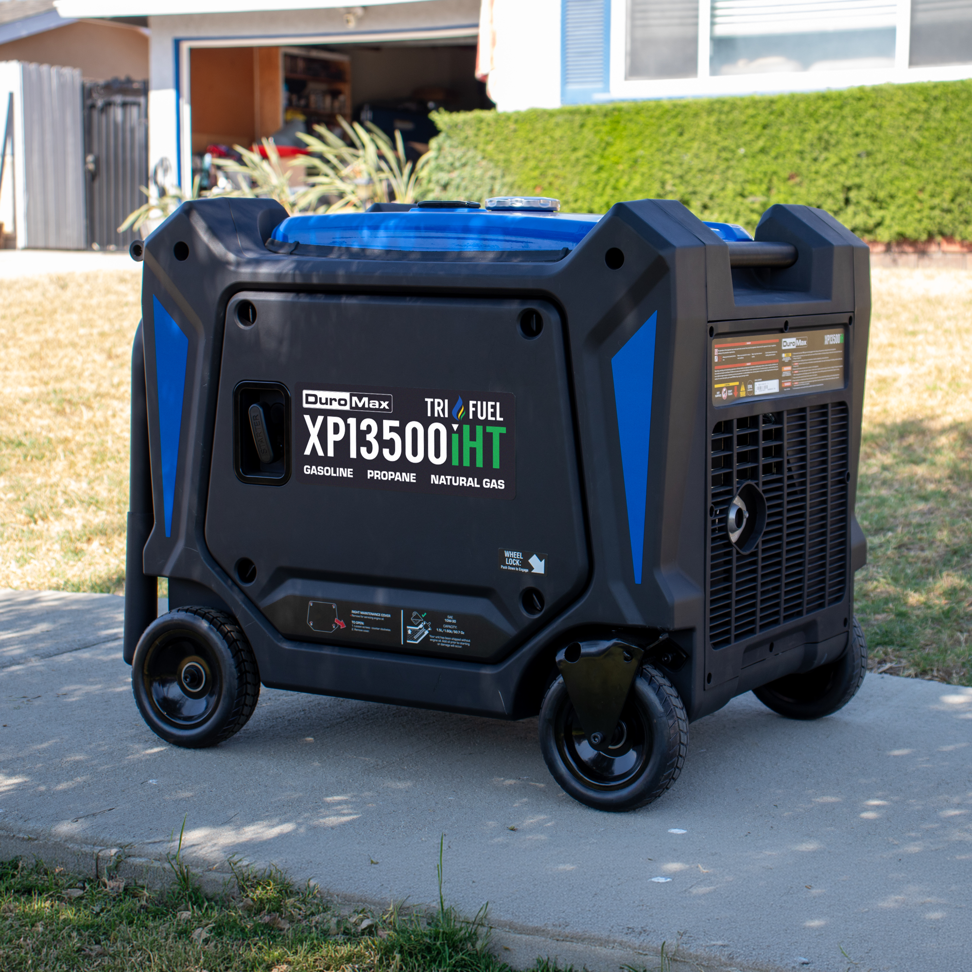 DuroMax XP13500iHT tri-fuel inverter generator, panel-side studio product photo