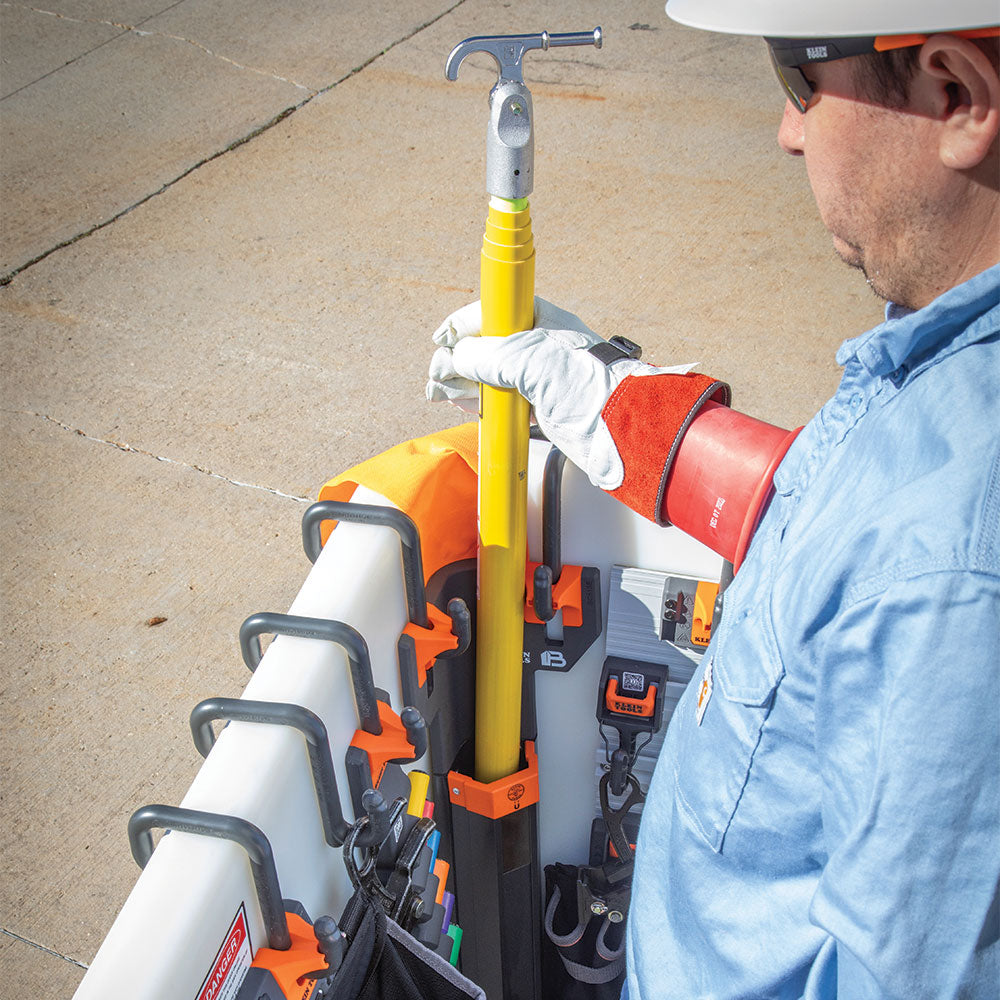 Klein Hot Stick Holder in use on a utility bucket