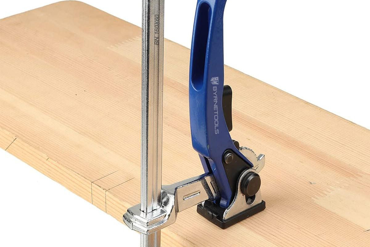 Byrne quick release ratchet clamp clamped to a workbench top