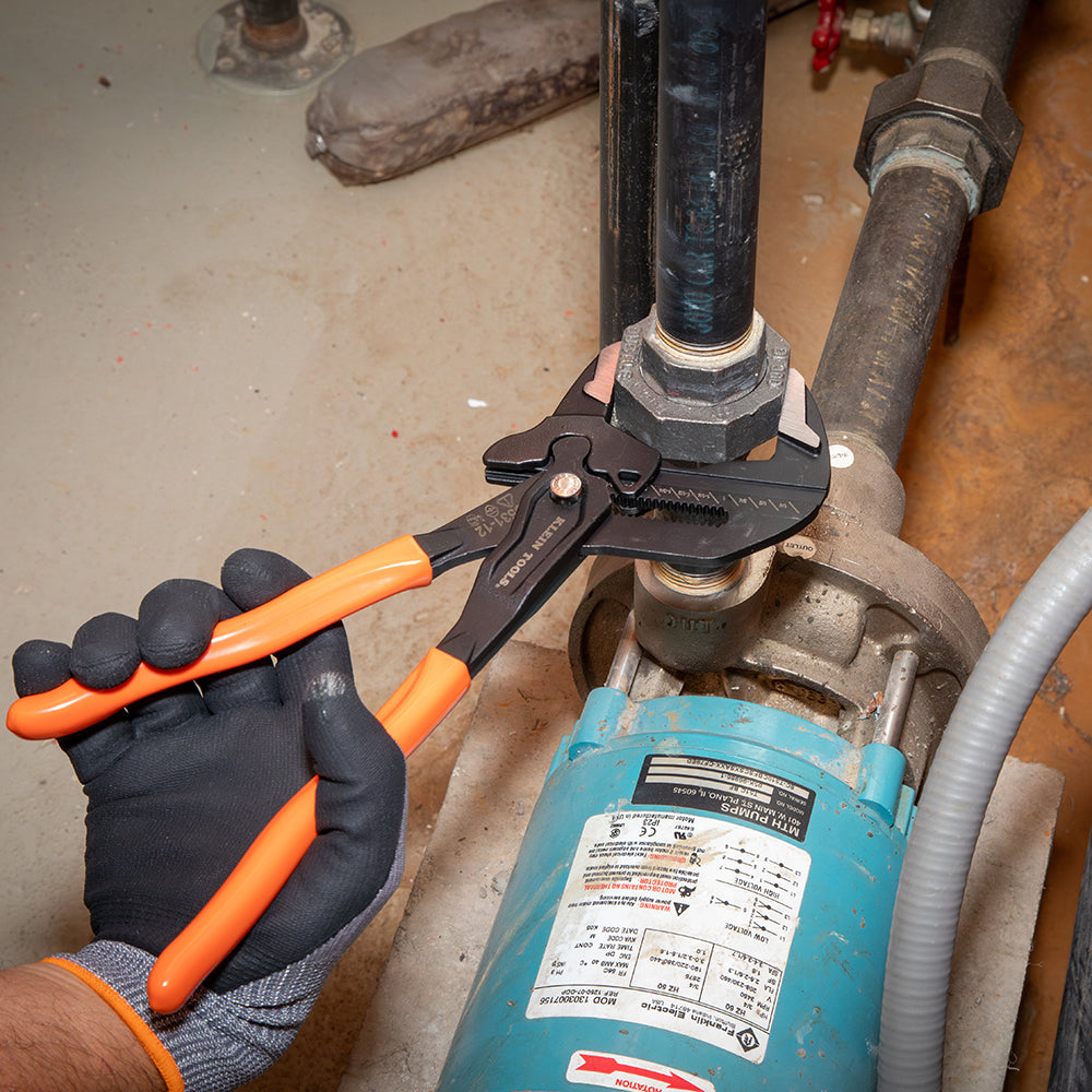 Klein compact plier wrench gripping a hex bolt