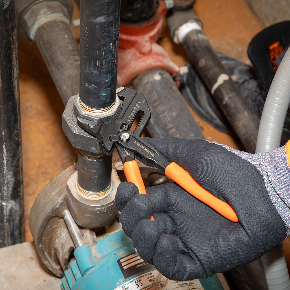 Klein compact plier wrench gripping a hex bolt
