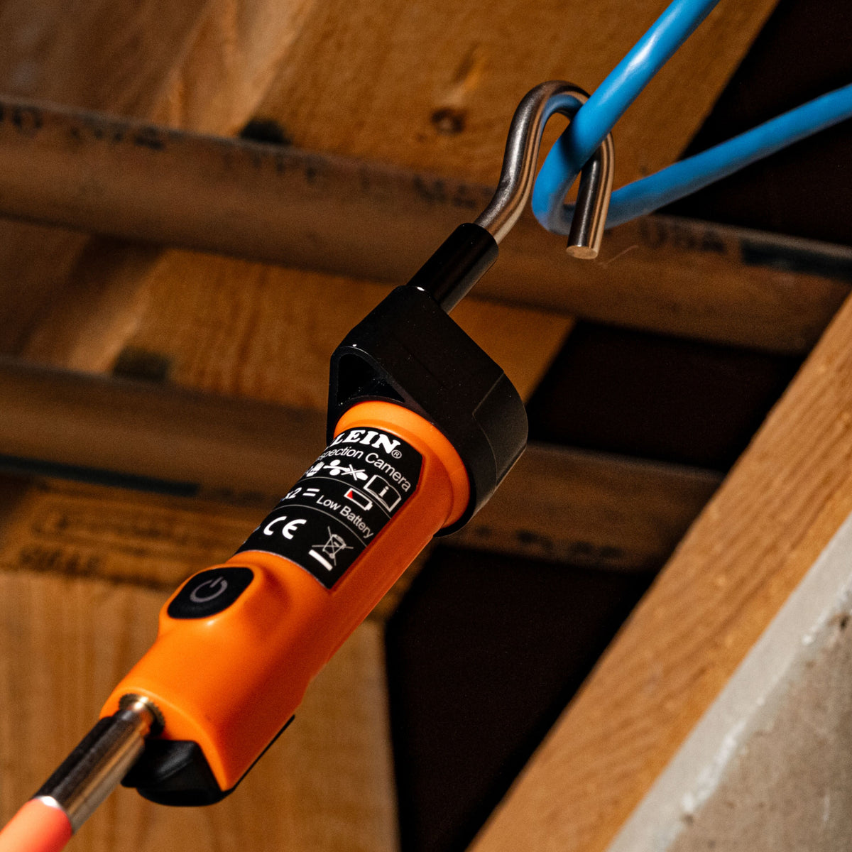 Klein Tools Compact Wireless Inspection Camera (ET30) inspecting inside a wall cavity