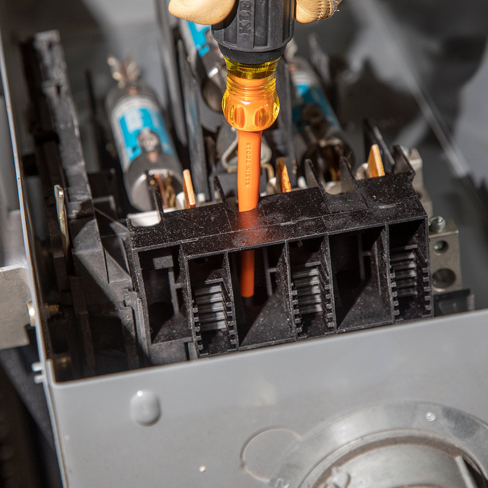 Klein slim-tip insulated screwdriver at a terminal block